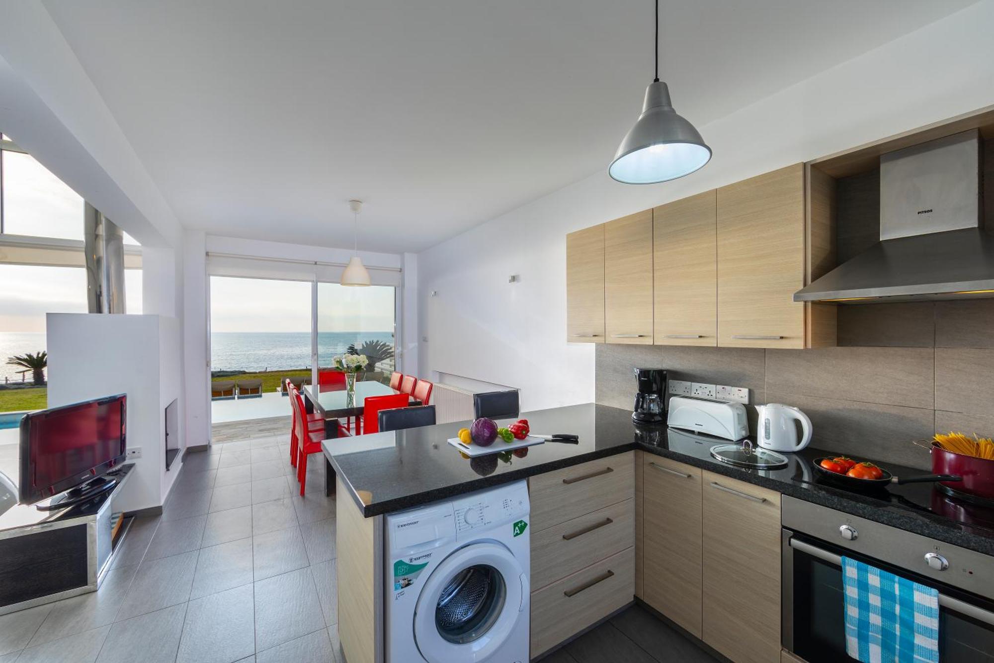 Blue Coral Villas: Exclusive Oceanfront Retreat Coral Bay