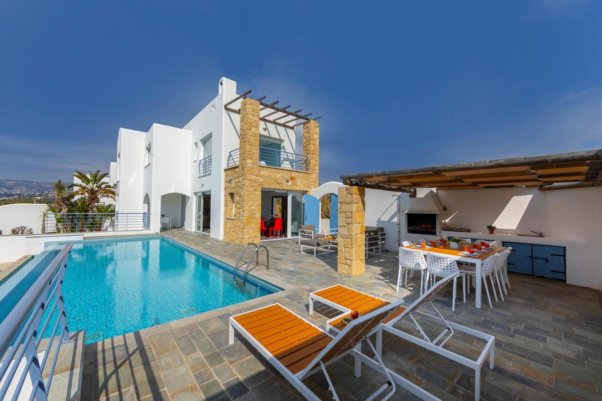 Villa Blue Coral Villas: Exclusive Oceanfront Retreat Coral Bay