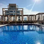 Olivia Palm Hotel