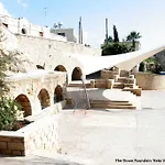 Melpo Court