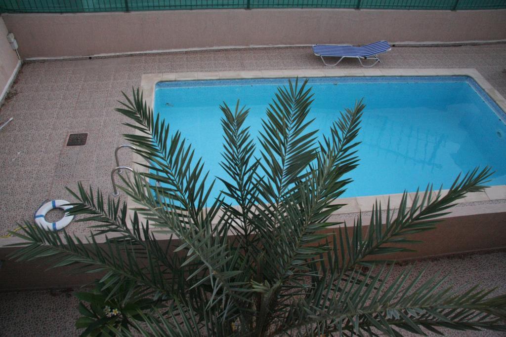 Theos Holiday Houses *
