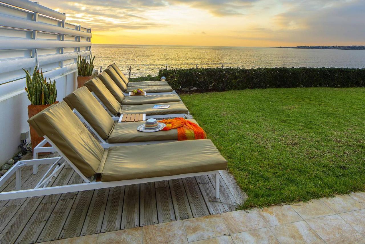 Blue Coral Villas: Exclusive Oceanfront Retreat *
