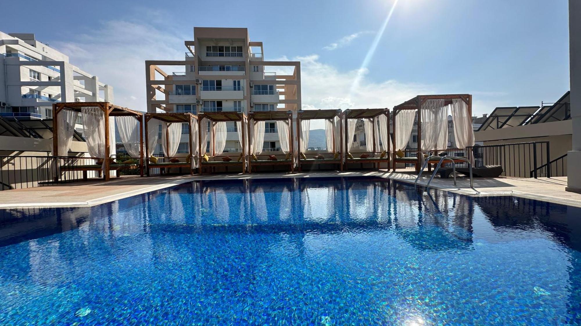 Olivia Palm Hotel