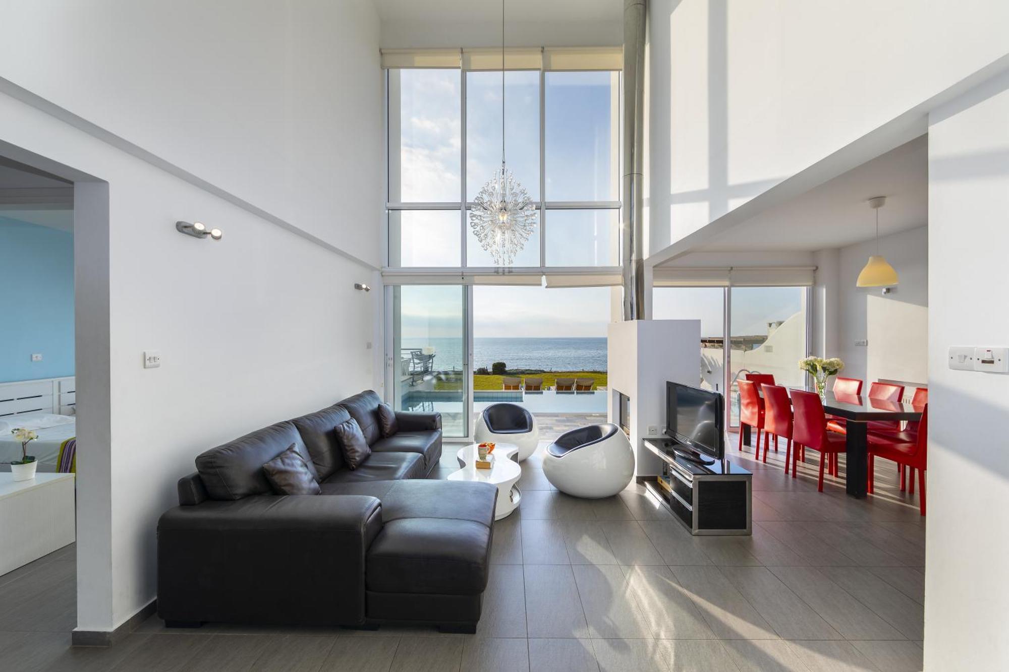 Blue Coral Villas: Exclusive Oceanfront Retreat Coral Bay