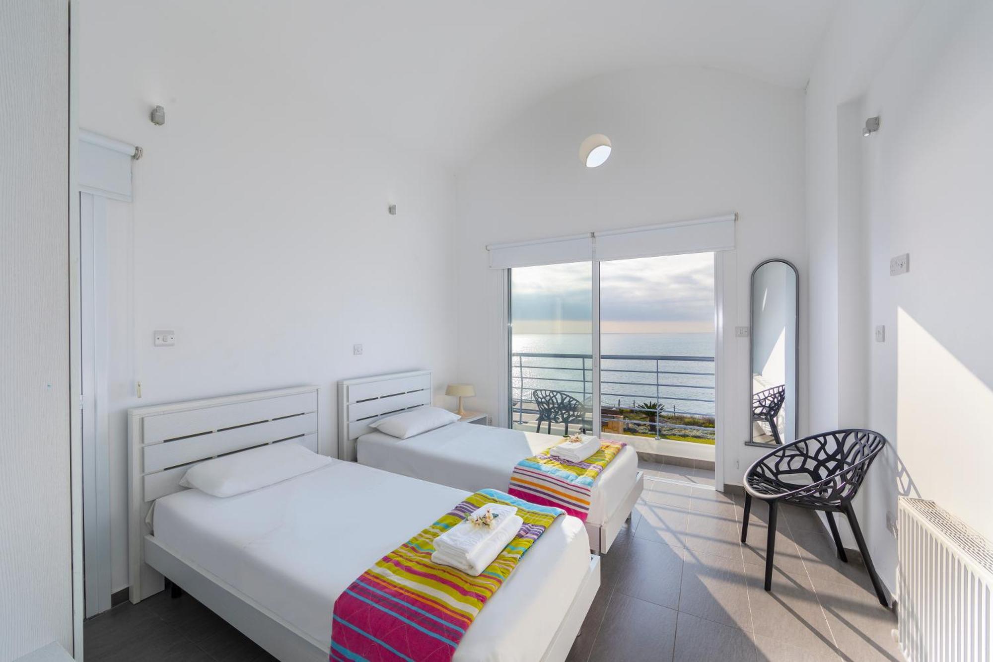 Blue Coral Villas: Exclusive Oceanfront Retreat *