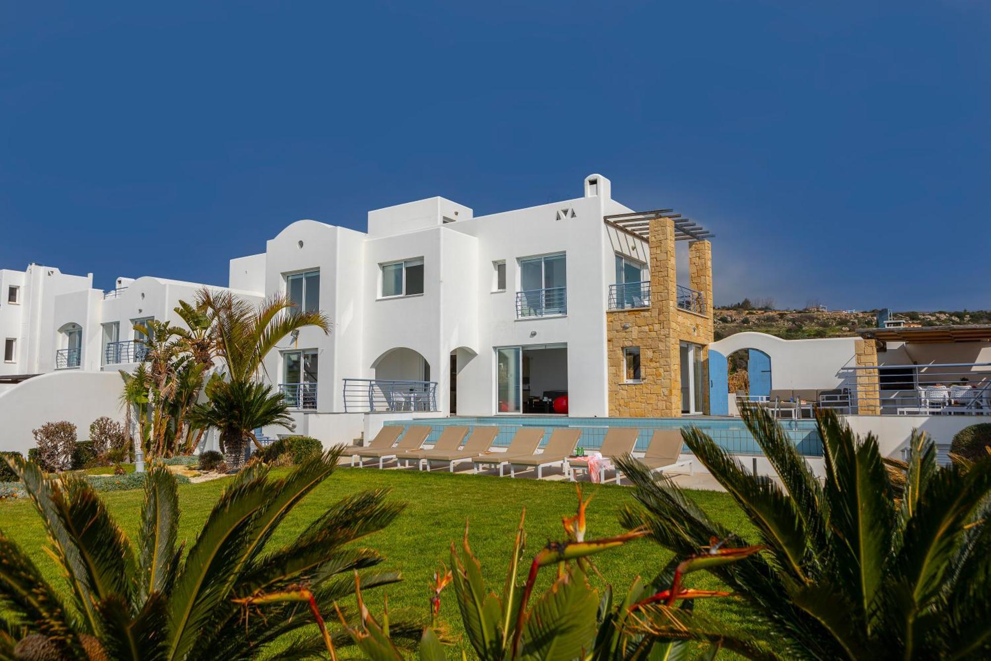 Blue Coral Villas: Exclusive Oceanfront Retreat *