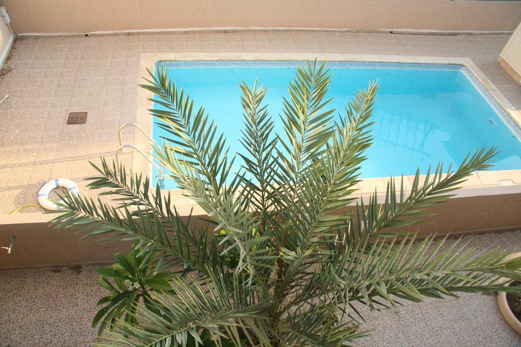 Theos Holiday Houses